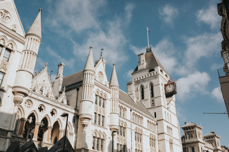 Royal Courts Justice building facade during a sunny day,